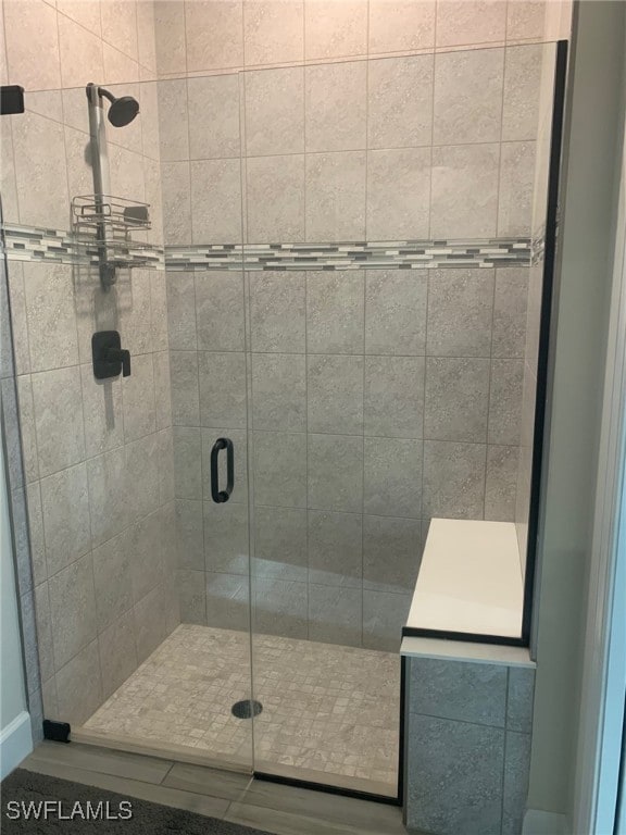 bathroom with an enclosed shower