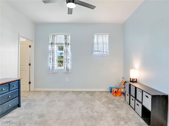 interior space featuring ceiling fan