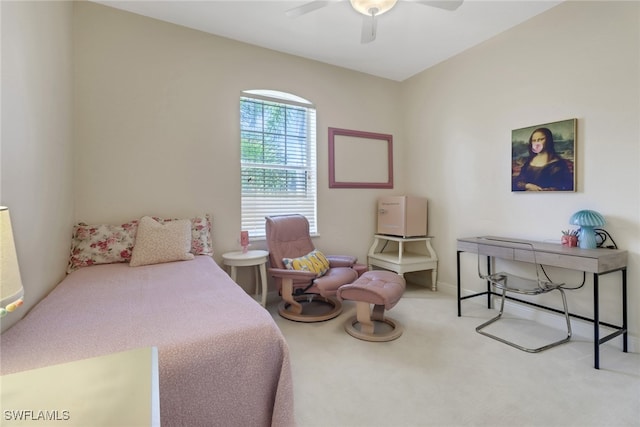 bedroom featuring light carpet and ceiling fan