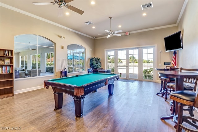 playroom featuring pool table, french doors, ceiling fan, hardwood / wood-style flooring, and ornamental molding