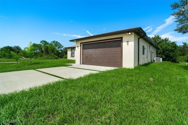 garage with a yard