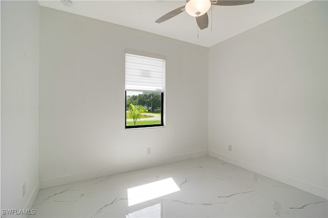 spare room featuring ceiling fan