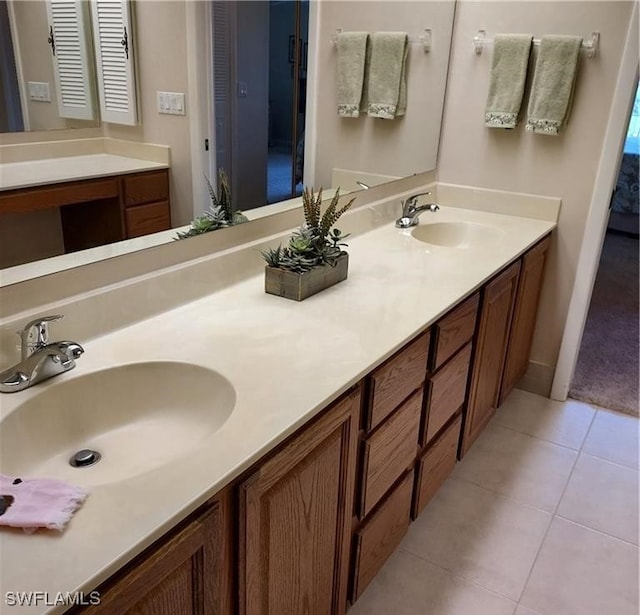 bathroom with tile patterned flooring and vanity