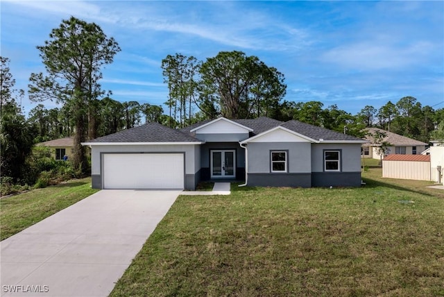 ranch-style home featuring a front yard, french doors, and a garage