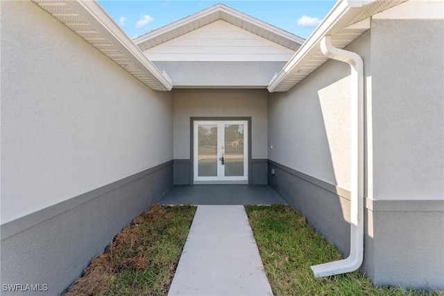 164 Thornton Ave S, Lehigh Acres, FL 33974 - property entrance featuring french doors