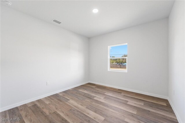 164 Thornton Ave S, Lehigh Acres, FL 33974 - unfurnished room featuring light hardwood / wood-style floors