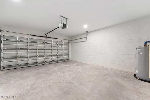164 Thornton Ave S, Lehigh Acres, FL 33974 - garage with water heater and a garage door opener