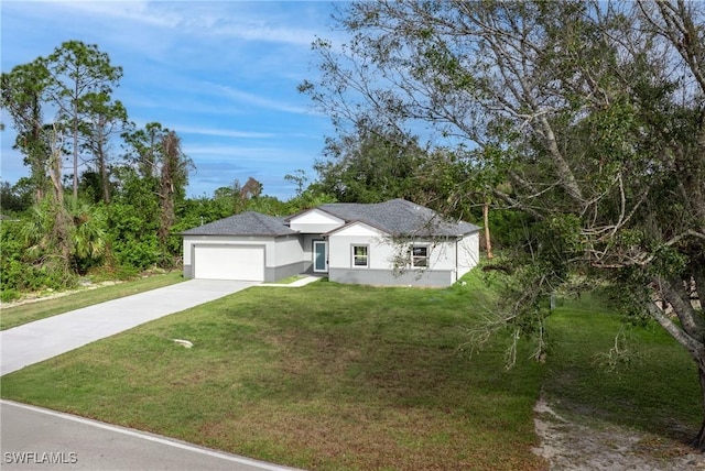 view of front facade featuring a garage and a front lawn