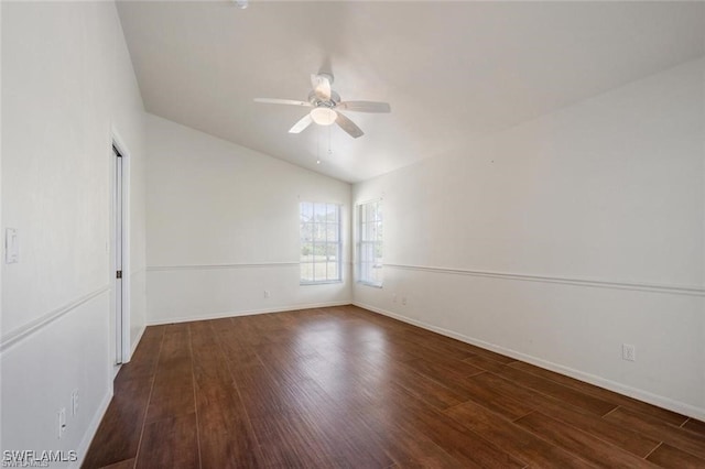 spare room with ceiling fan and dark hardwood / wood-style flooring