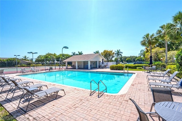 view of swimming pool featuring a patio