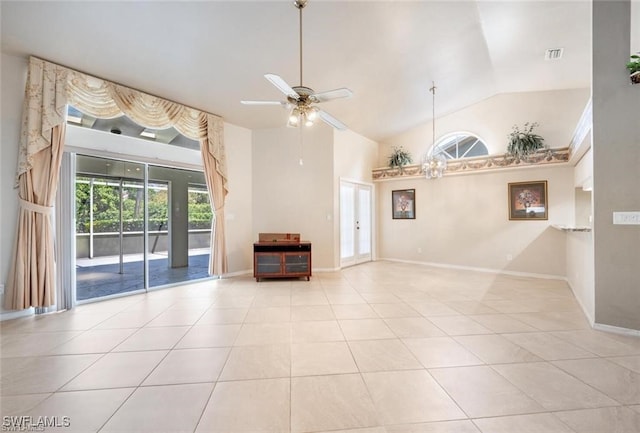 unfurnished living room with ceiling fan, high vaulted ceiling, and light tile patterned floors