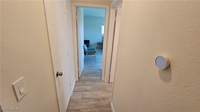 hall featuring light hardwood / wood-style flooring