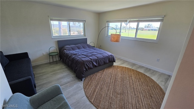 bedroom featuring light hardwood / wood-style flooring