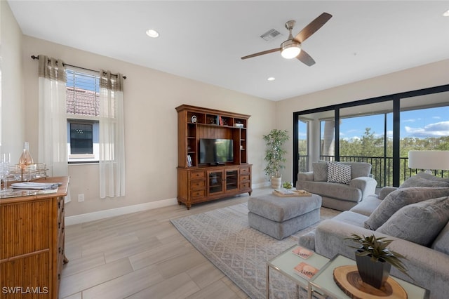 living room featuring ceiling fan