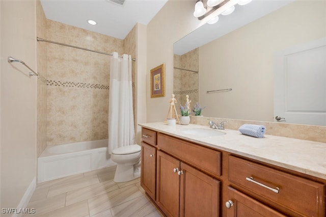 full bathroom featuring vanity, toilet, and shower / tub combo with curtain