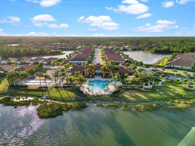 birds eye view of property featuring a water view