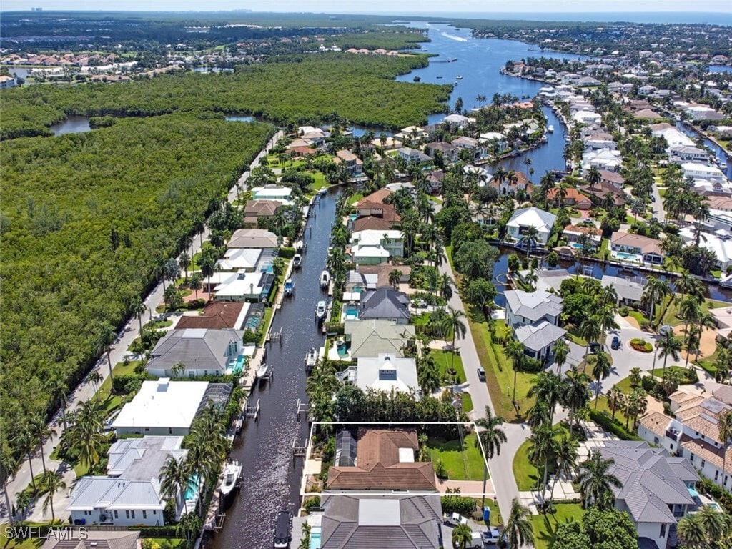 bird's eye view with a water view