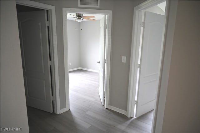 hall featuring wood-type flooring