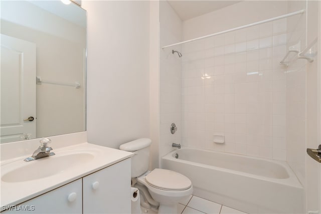 full bathroom with vanity, toilet, tiled shower / bath combo, and tile patterned flooring