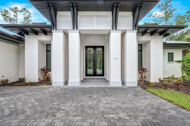 doorway to property featuring french doors