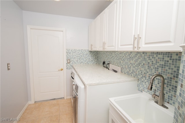 washroom with sink and light tile patterned floors