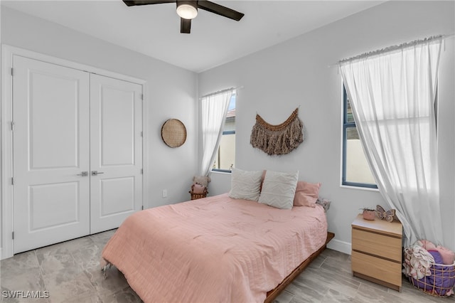 bedroom with a closet and ceiling fan