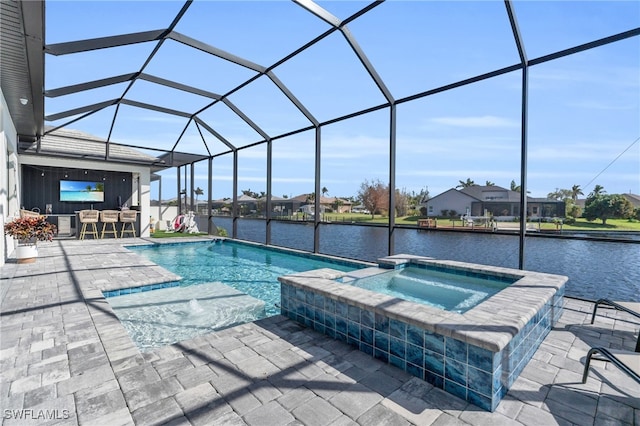 view of swimming pool featuring a patio, an in ground hot tub, a water view, and glass enclosure