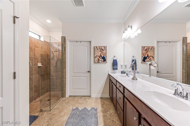 bathroom featuring vanity, crown molding, and tiled shower