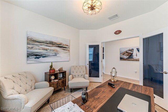 interior space featuring french doors and tile patterned flooring