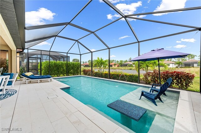 view of pool featuring a patio, pool water feature, and a lanai