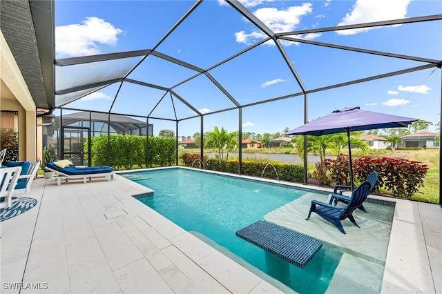 outdoor pool featuring a lanai and a patio area