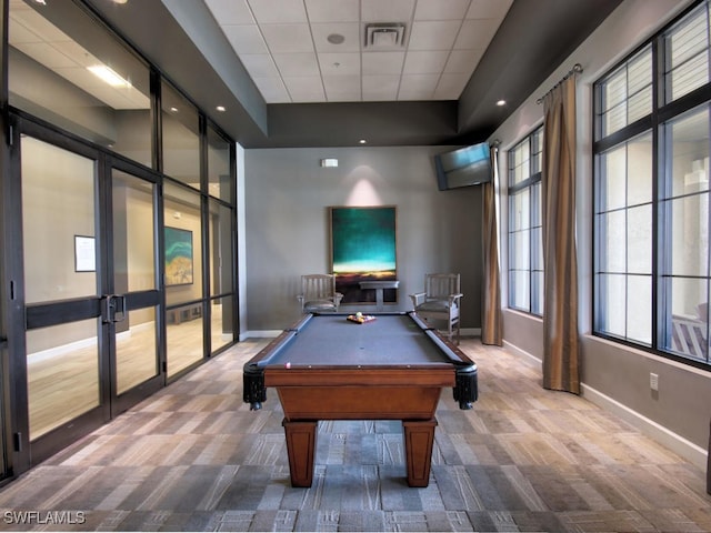 recreation room featuring a drop ceiling, carpet floors, and billiards