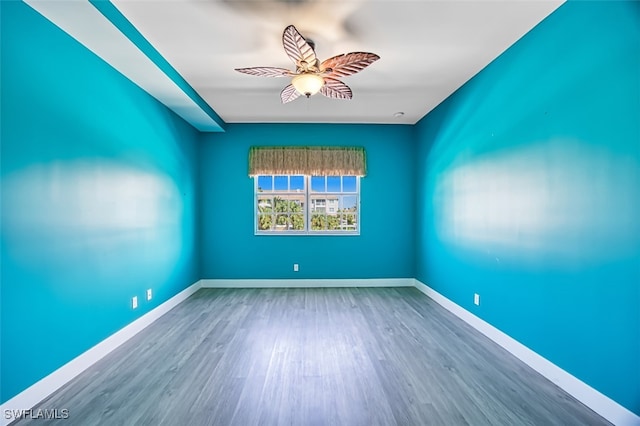 11701 Olivetti Ln Unit 307, Fort Myers, FL 33908 - empty room with baseboards, ceiling fan, and wood finished floors