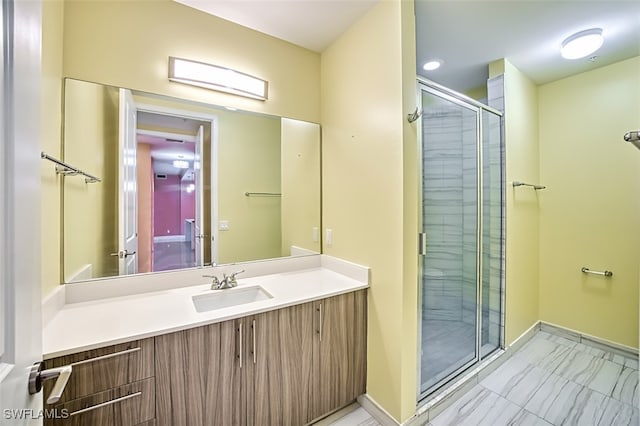 bathroom with vanity and walk in shower