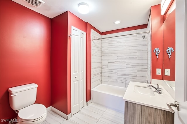 11701 Olivetti Ln Unit 307, Fort Myers, FL 33908 - full bath featuring vanity, toilet, baseboards,  shower combination, and visible vents