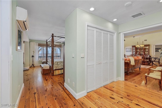 hallway with wood-type flooring