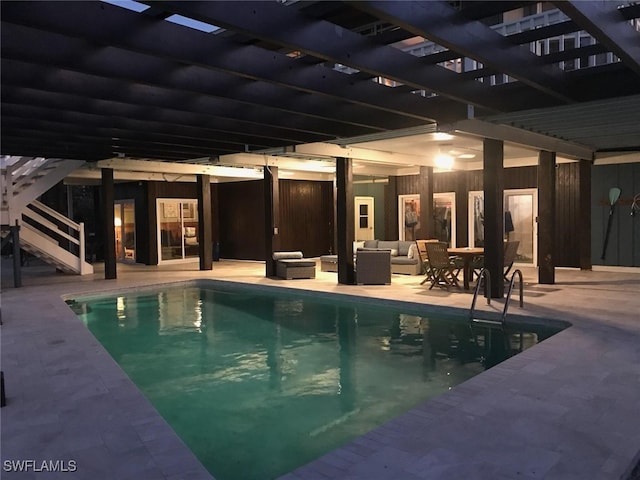 view of swimming pool with an outdoor living space, a patio area, and a pergola