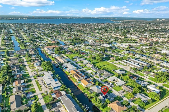 aerial view featuring a water view