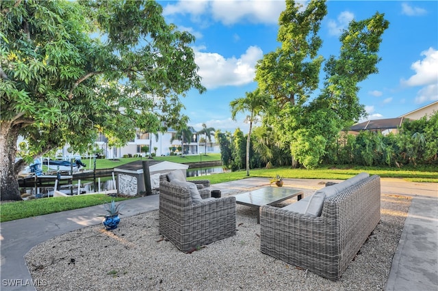 view of patio with a water view