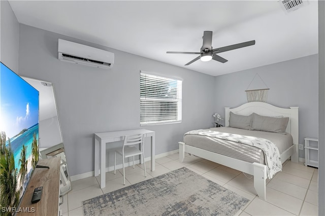 tiled bedroom with ceiling fan and an AC wall unit