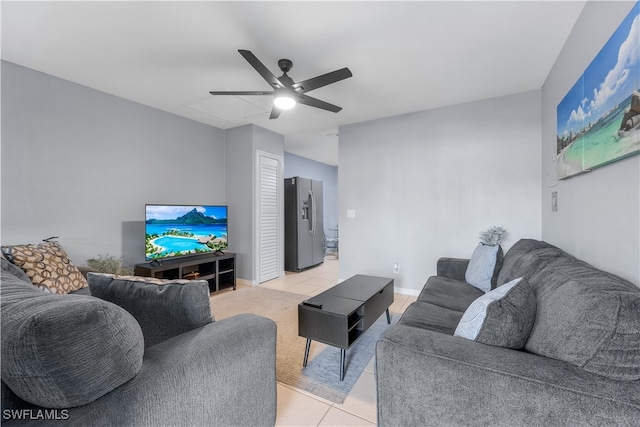 tiled living room featuring ceiling fan