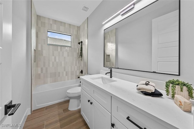 14081 Carlos St, Fort Myers, FL 33905 - full bathroom with vanity, bathing tub / shower combination, and wood finished floors