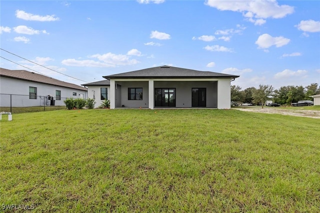 14081 Carlos St, Fort Myers, FL 33905 - rear view of property with stucco siding