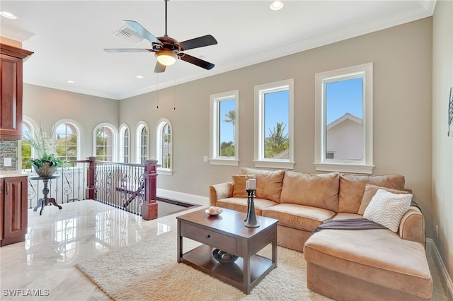 living room featuring ceiling fan and crown molding