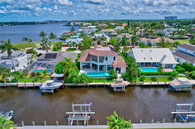 birds eye view of property featuring a water view