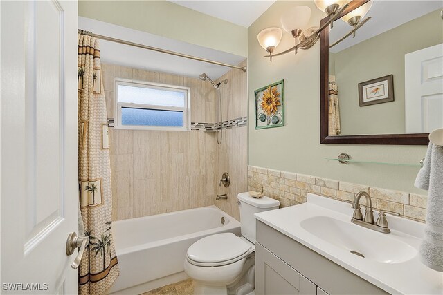 full bathroom featuring vanity, toilet, shower / bathtub combination with curtain, and tile walls