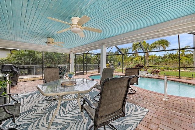 sunroom / solarium with ceiling fan and a wealth of natural light