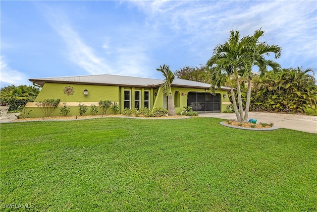 single story home featuring a sunroom and a front lawn