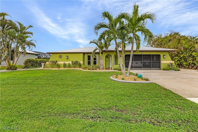 ranch-style home featuring a front yard