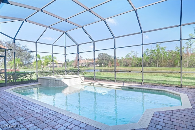 view of pool with an in ground hot tub and glass enclosure